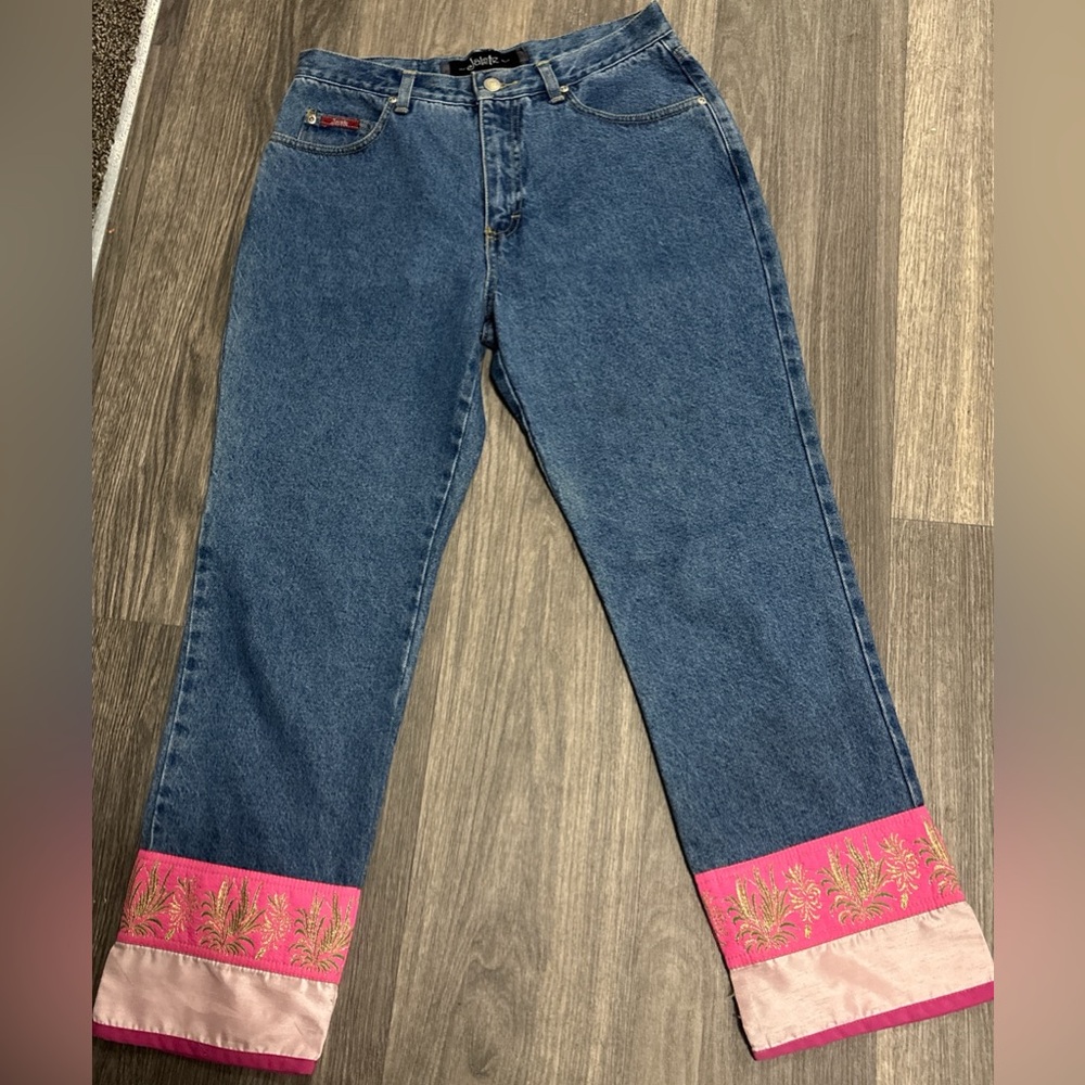 Vintage denim jeans with embroidered and satin cuffs